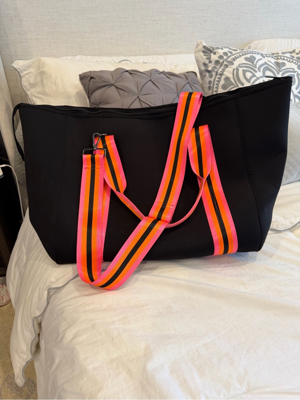 Haute Shore Black Travel Bag with Neon Pink & Orange Strap